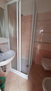 Koupelna v ubytování Hotel Luana