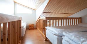 Postel nebo postele na pokoji v ubytování Lapland Hotels Sirkantähti