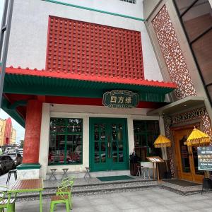 a building with a green door and a sign on it at Casabella 203 BCS A2 Grand Batam Penuin Wet Market in Nagoya +7 photos