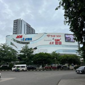 a large building with a sign on the side of it at Casabella 203 BCS A2 Grand Batam Penuin Wet Market in Nagoya