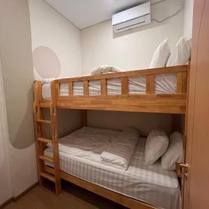 Voodi või voodid majutusasutuse Casabella Homestay 106 Batam Penuin toas