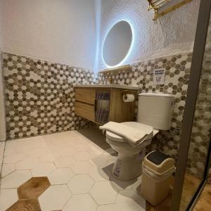 a bathroom with a toilet and a sink at Casabella 106 BCS A2 Grand Batam Penuin Wet Market in Nagoya +15 photos