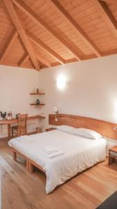 Cascina Bagaggera客房内的一张或多张床位