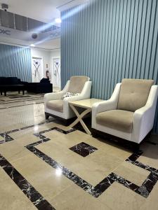 Posezení v ubytování Amsterdam Otel Economic Room + 16 fotografií