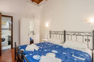 Posteľ alebo postele v izbe v ubytovaní Heart of Florence - San Lorenzo Lovely Apartment