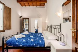 Posteľ alebo postele v izbe v ubytovaní Heart of Florence - San Lorenzo Lovely Apartment