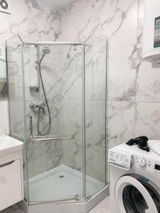 Phòng tắm tại Apartments Domovik Myru St. 11s/21