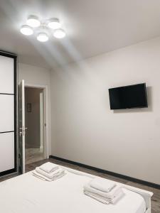 TV/trung tâm giải trí tại Apartments Domovik Myru St. 11s/21