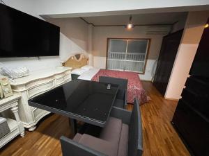 TV a/nebo společenská místnost v ubytování Guest House Koza Gate2