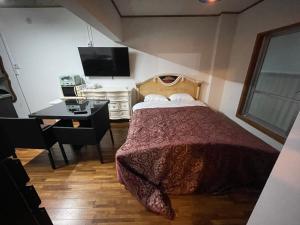 Postel nebo postele na pokoji v ubytování Guest House Koza Gate2