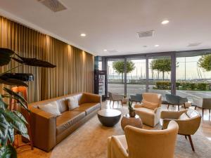 Posezení v ubytování Mövenpick Hotel Lausanne + 37 fotografií