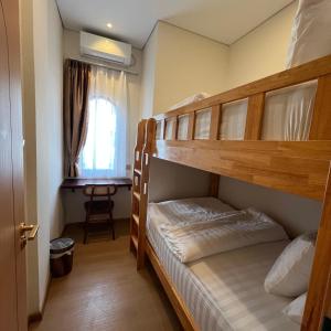 Postel nebo postele na pokoji v ubytování Casabella Homestay 306 Batam Penuin