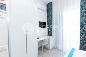 TV a/nebo společenská místnost v ubytování Di Ma B&B