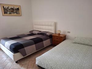 Postel nebo postele na pokoji v ubytování Casina Membrino