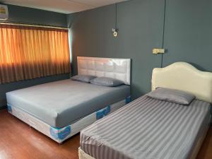 Dailyroom C3 by Anna客房内的一张或多张床位