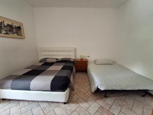Postel nebo postele na pokoji v ubytování Casina Membrino