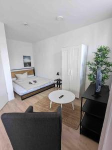 Ένα ή περισσότερα κρεβάτια σε δωμάτιο στο Stylish Studio for Two Prime Location in Hamburg