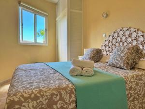 Katil atau katil-katil dalam bilik di Cristianmar - Ocean View - 200mt from the beach