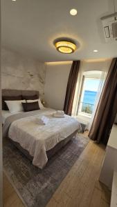 Postel nebo postele na pokoji v ubytování B&B Skynight Split