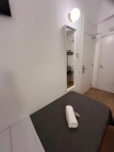 Posteľ alebo postele v izbe v ubytovaní Hostal Argo