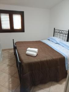 Postel nebo postele na pokoji v ubytování Newfaro2