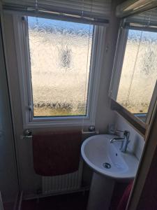 Et badeværelse på Durdlee Door, D27, Main Rd, West Lulworth, Wareham BH20 5PU + 34 billeder