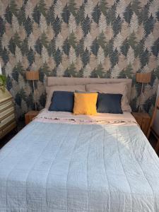 Postel nebo postele na pokoji v ubytování Apartament nad jeziorem