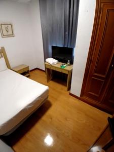 TV a/nebo společenská místnost v ubytování Hotel Mercado by gaiarooms