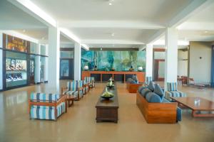TV a/nebo společenská místnost v ubytování Pandanus Beach Resort & Spa