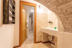 a bathroom with a sink and a shower at Suite n4 - Loft caratteristico nel centro storico in Perugia