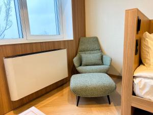 Postel nebo postele na pokoji v ubytování Resident Hotel Abay