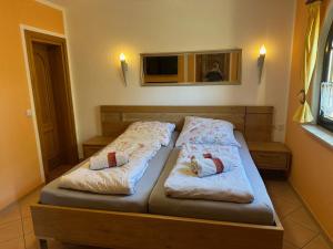 Postel nebo postele na pokoji v ubytování Ferienwohnung 1 Festungsblick