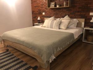 Postel nebo postele na pokoji v ubytování Cozy Residence Brasov