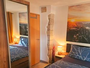 Postel nebo postele na pokoji v ubytování Sonniges Eck Ferienwohnung 1