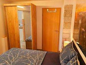 Postel nebo postele na pokoji v ubytování Sonniges Eck Ferienwohnung 1