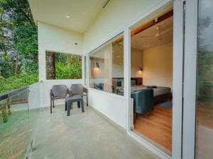 Istumisnurk majutusasutuses Forestscape Resort Munnar