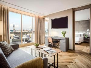 Ein Sitzbereich in der Unterkunft Anantara Grand Hotel Krasnapolsky Amsterdam