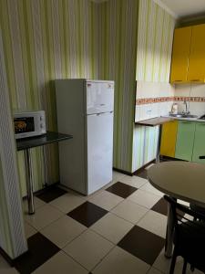 Kuchyň nebo kuchyňský kout v ubytování Green apartaments on Shirshova street + 1 fotografie