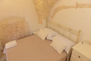 Ένα ή περισσότερα κρεβάτια σε δωμάτιο στο Casa Sorrentino Luxury Home