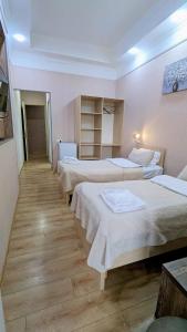 Voodi või voodid majutusasutuse Dkd-bridge Hotel toas