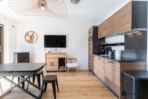 Η κουζίνα ή μικρή κουζίνα στο Apartment near Mont D'auron