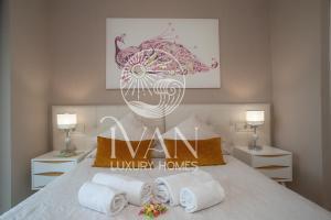 Postel nebo postele na pokoji v ubytování Casa Hugo Ivan Luxury Homes 8ªPlta Norte 1ªLinea