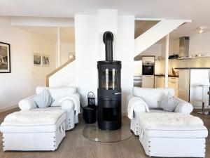 Posezení v ubytování Penthouse Kapitänsbrücke