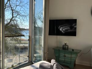 TV a/nebo společenská místnost v ubytování Penthouse Kapitänsbrücke