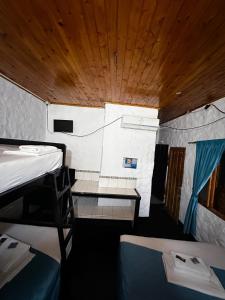 Postel nebo postele na pokoji v ubytování Hotel Mawill