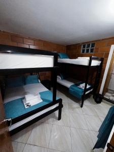 Postel nebo postele na pokoji v ubytování Hotel Mawill