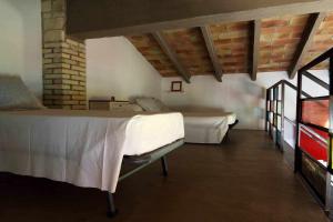 Posteľ alebo postele v izbe v ubytovaní Masia Botargo 9 hab 8 baños piscina porche