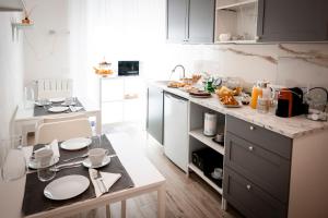 Kuchyň nebo kuchyňský kout v ubytování Da Filippo B&B + 37 fotografií