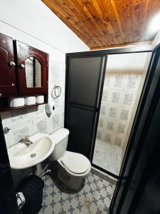 Koupelna v ubytování Hotel Mawill
