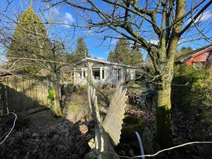 Κήπος έξω από το Natuurbungalow Het Koolmeesje